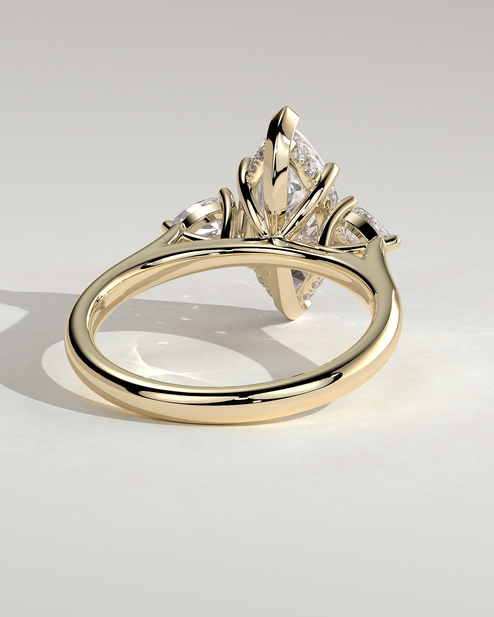Marquise & Pear three Diamond Hidden Halo Diamond Ring
